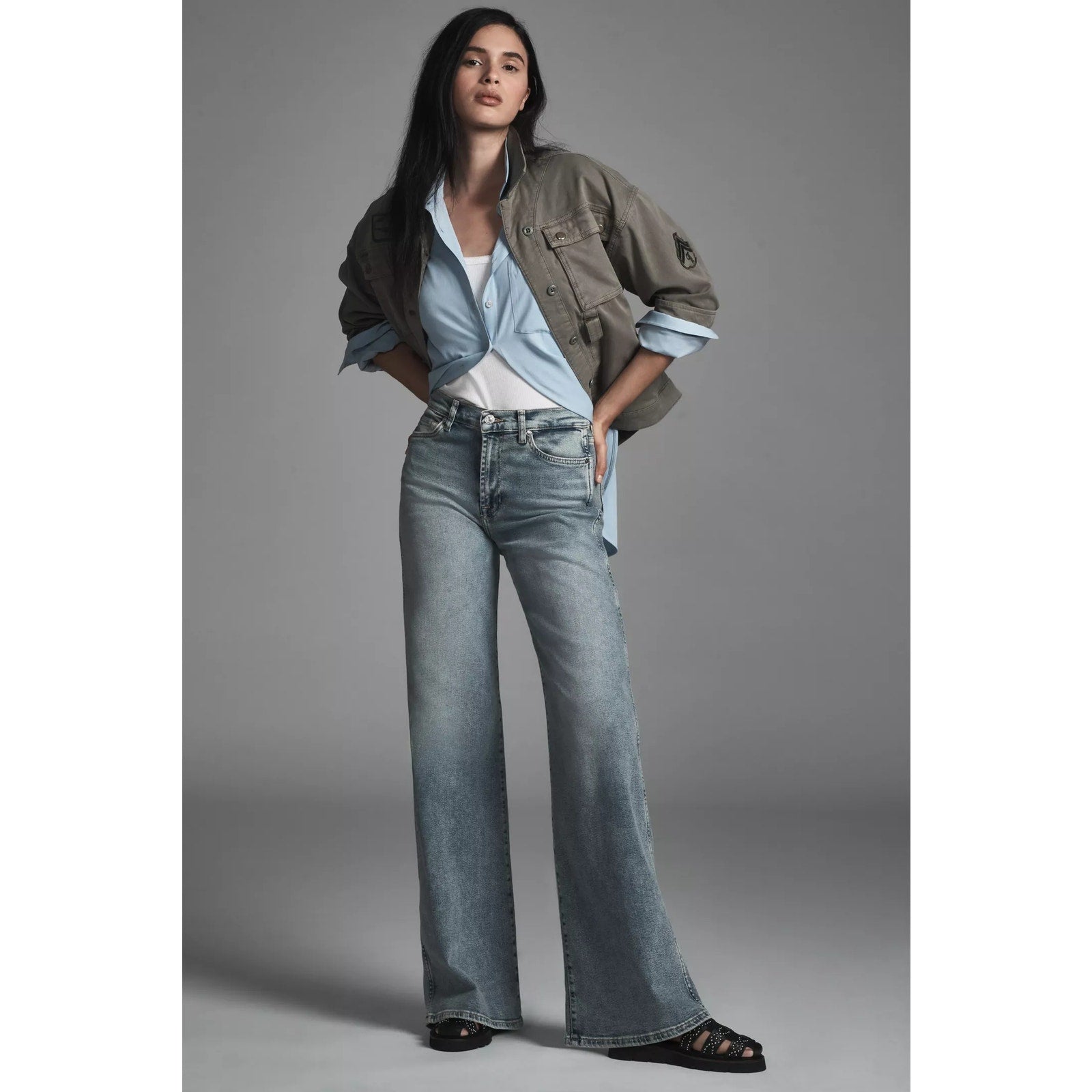 Blue mid-rise wide-leg jeans with front pockets and belt loops