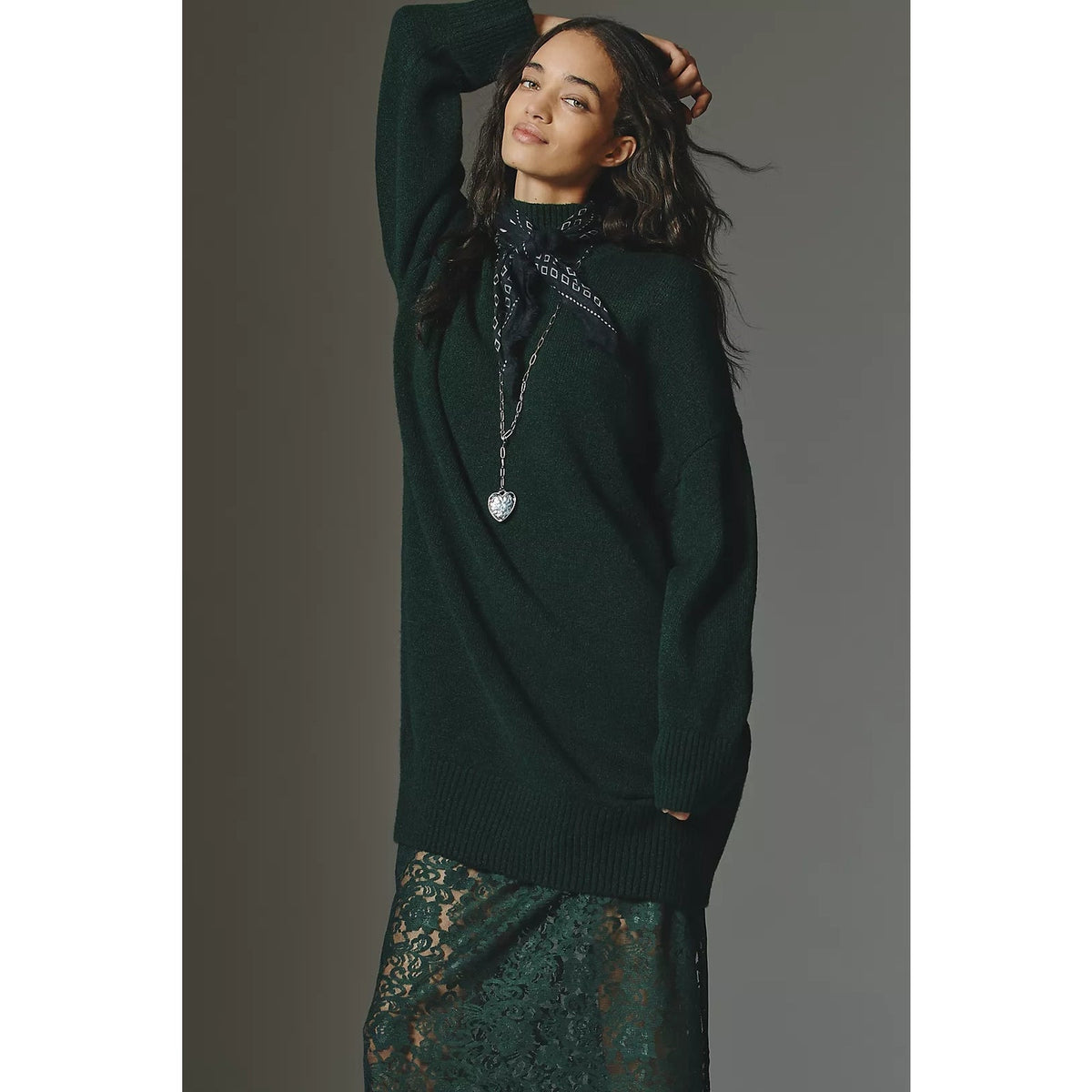 Green twofer midi dress with oversized sweater and floral lace skirt