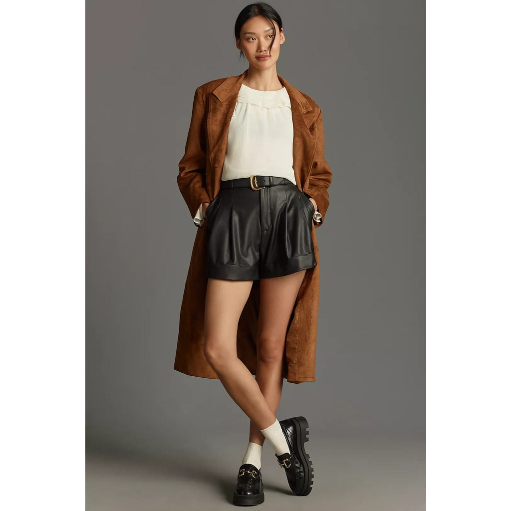Black faux leather pleated shorts with cuffed hem and side pockets