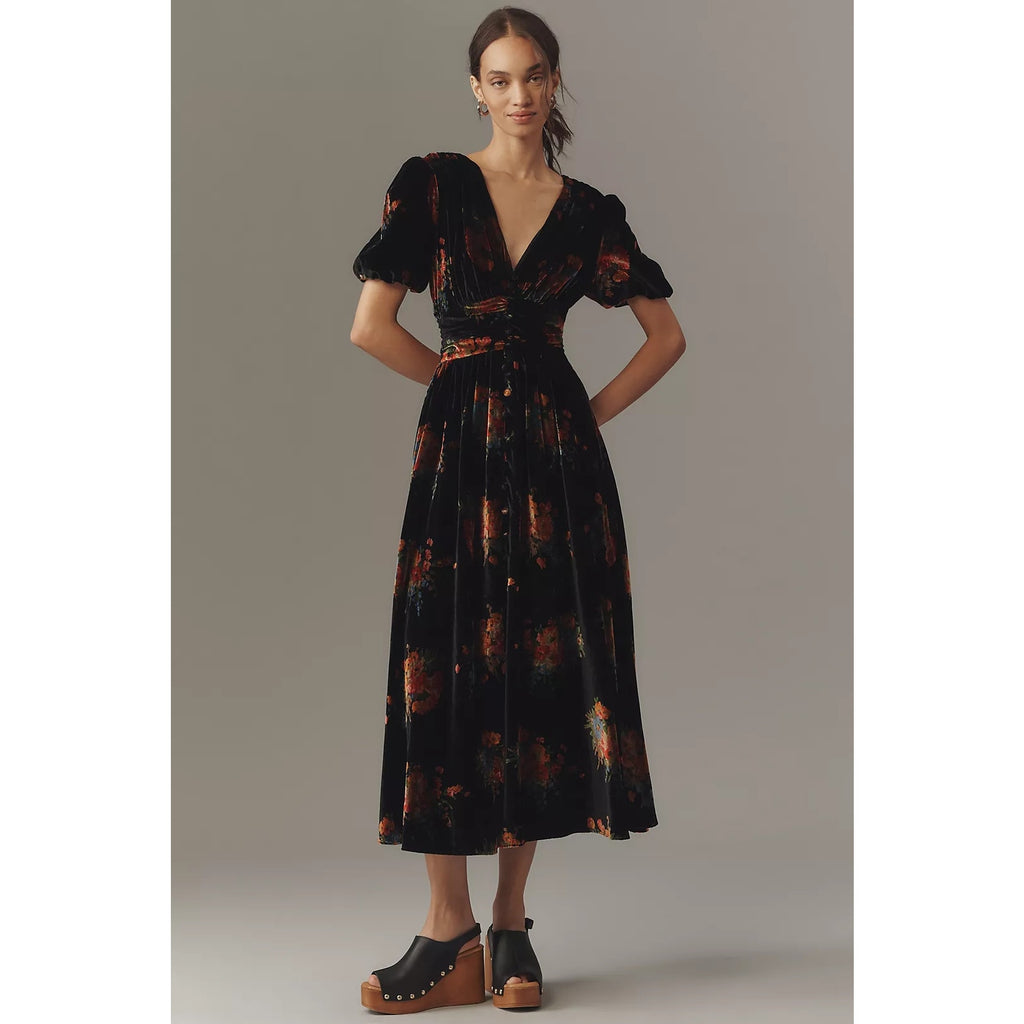 Black velvet button-front midi dress with puff sleeves and multicolor abstract pattern