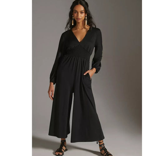 Black V-neck wide-leg jumpsuit with long sleeves and smocked waist detail