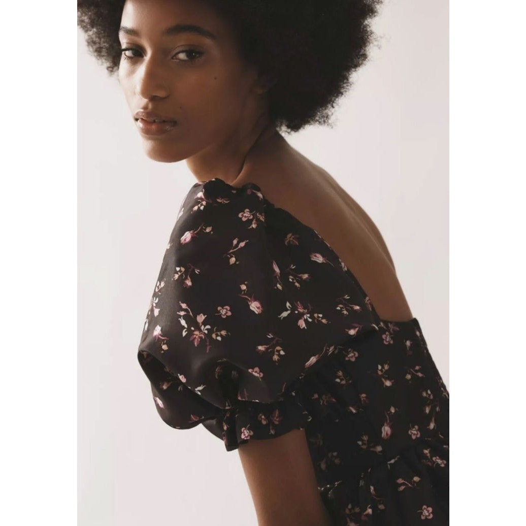 Black floral mini dress with puff sleeves and square back