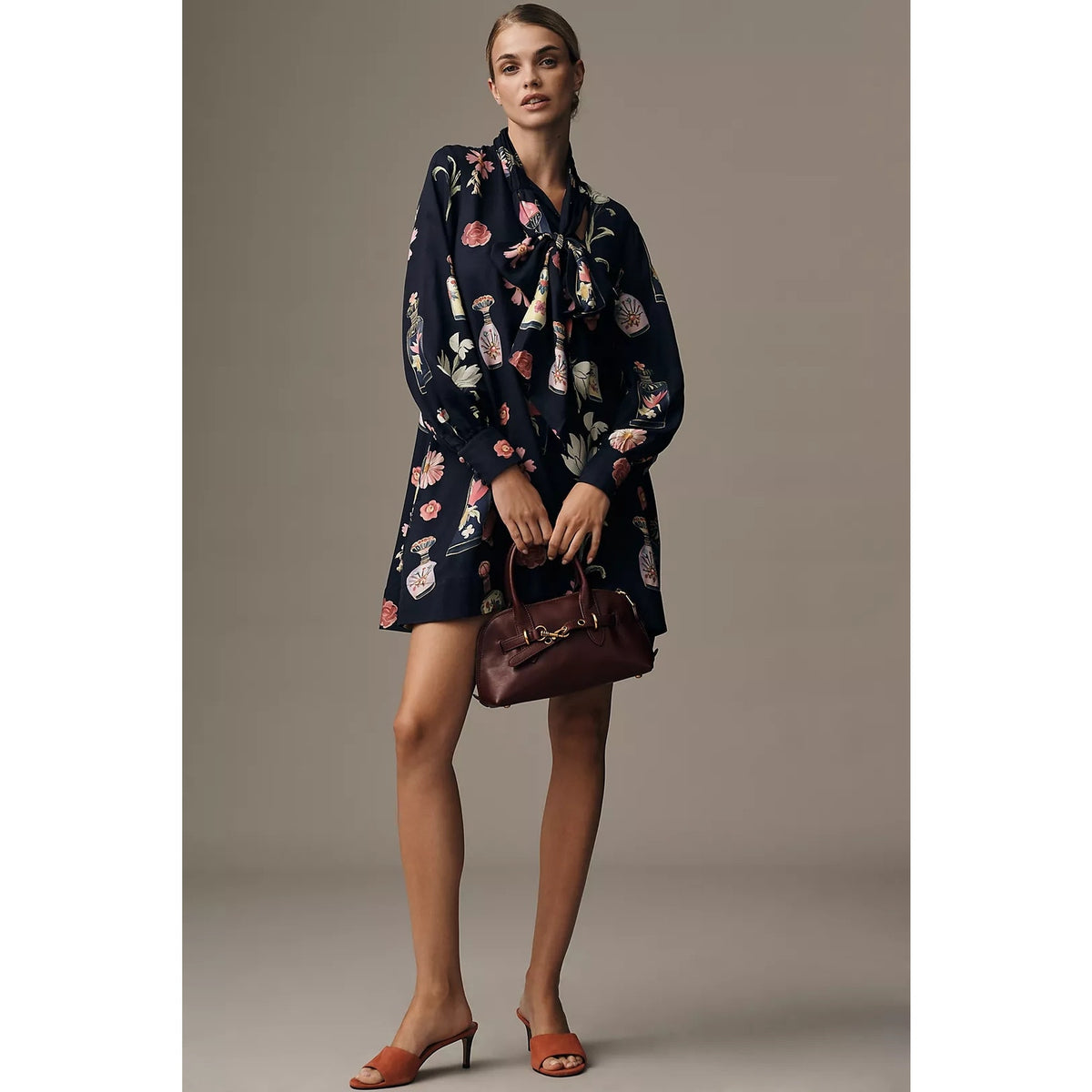 Navy floral long-sleeve tie-neck mini dress with button front detail