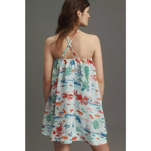 Printed halter swing mini dress, open back with crisscross straps, white and multicolor ocean print