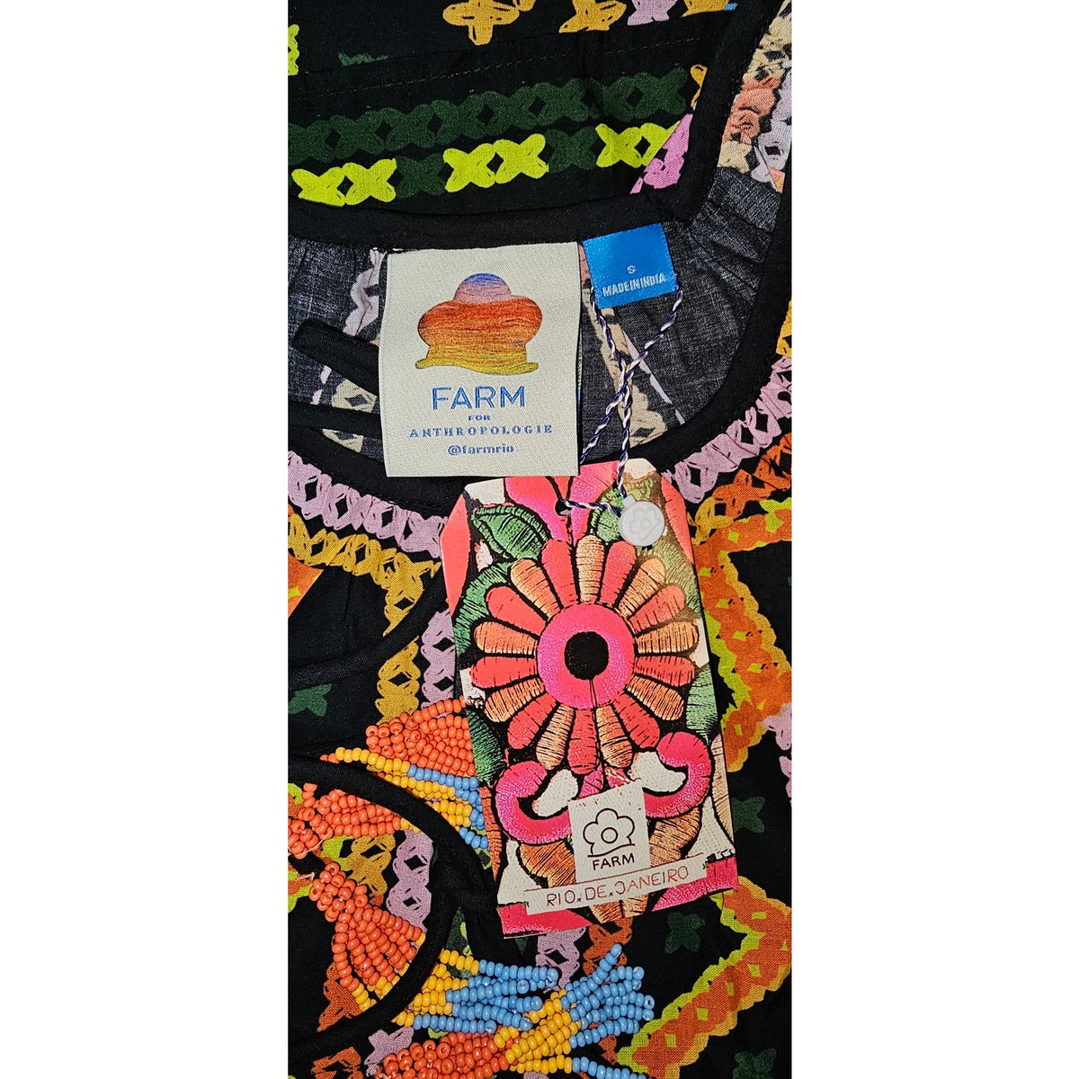 Embroidered dress patch with FARM Rio de Janeiro label and multicolor floral design
