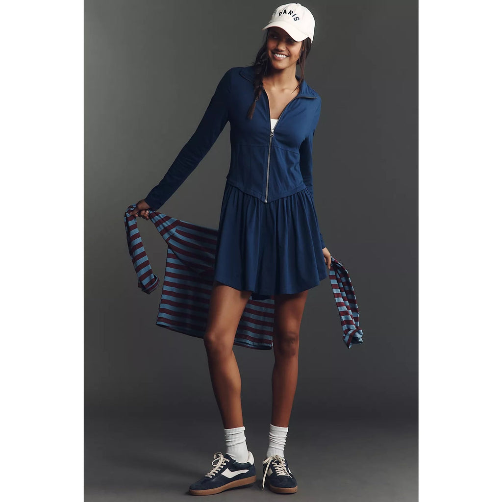 Navy long-sleeve mini dress with a zip front, fitted bodice, and gathered skirt