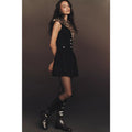Black faux fur collar mini dress with leopard trim, sleeveless and button detail