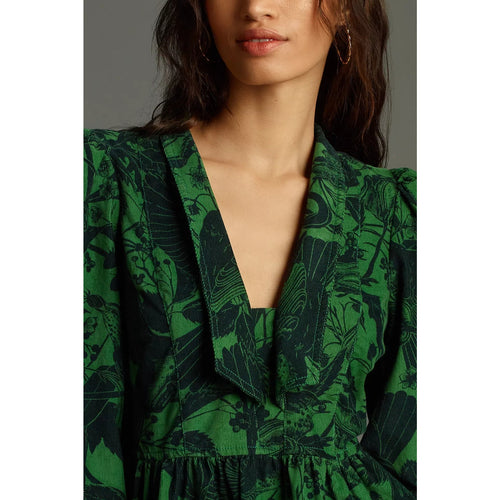 Green corduroy babydoll mini dress with V-neck and gathered bodice