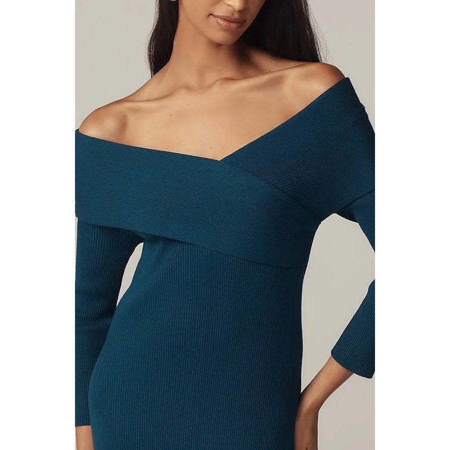 Close-up of blue off-shoulder knit sweater dress bodice and sleeve