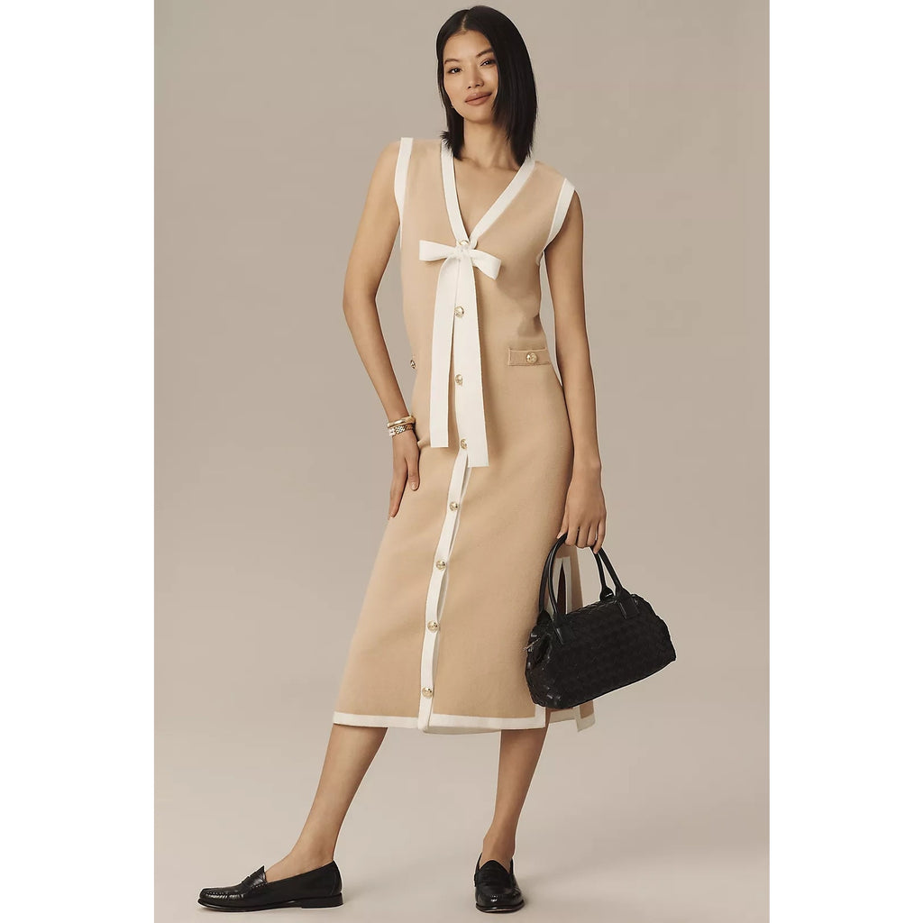 Sleeveless bow-button knit midi dress with contrast V-neck and ribbon tie, medium length