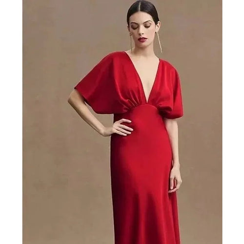 Red satin deep-V gown with flutter sleeves and cinched waist, full-length