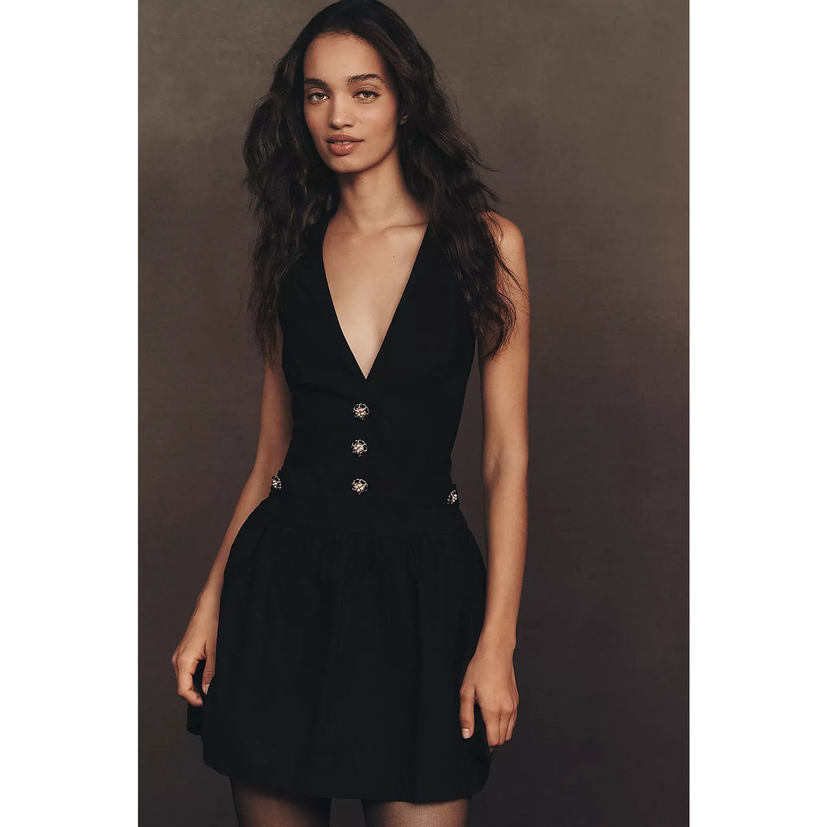 Black V-neck mini dress with leopard faux fur collar and gold-toned button trim