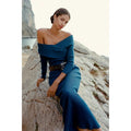Off-shoulder blue sweater dress with fitted knit bodice and flared hem