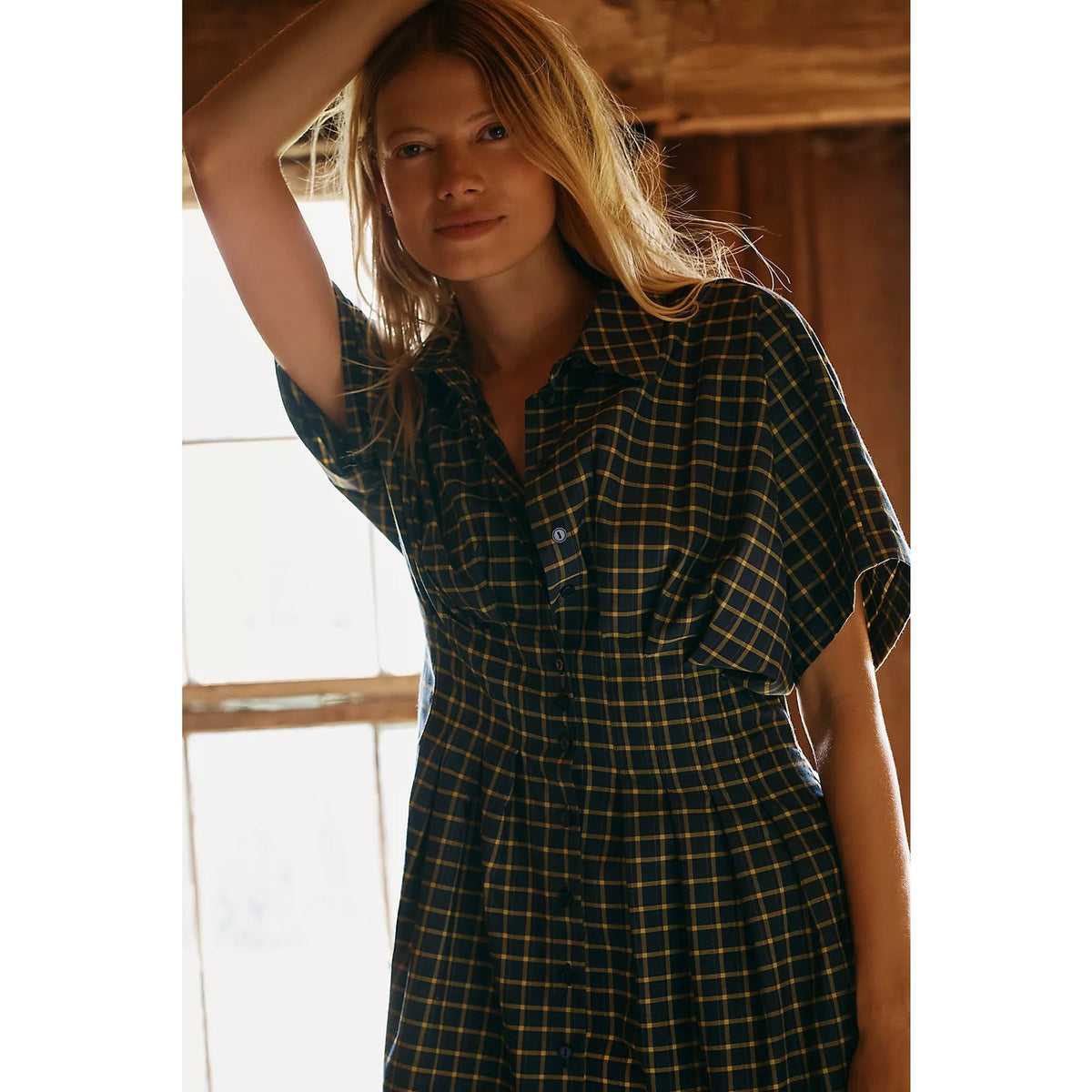 Blue plaid mini shirt dress with short sleeves and button front