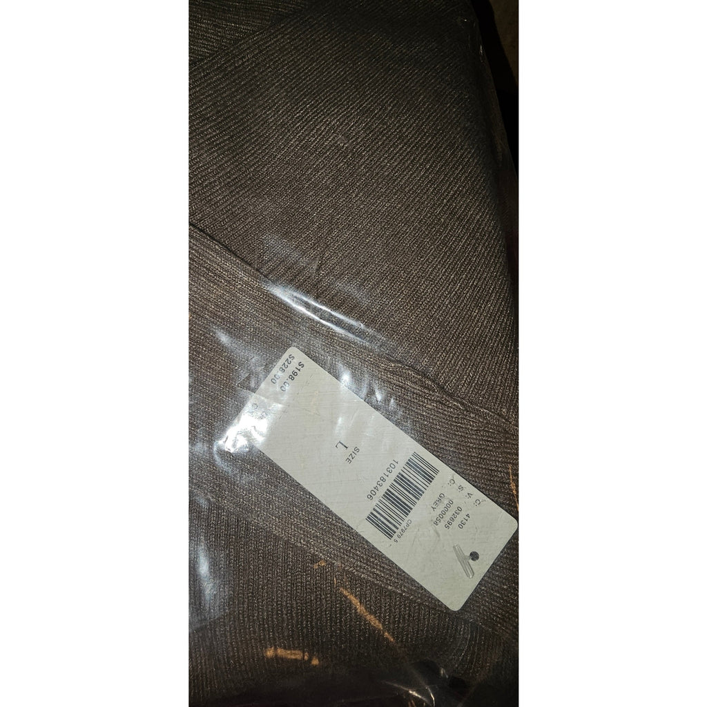 Knitted sweater dress fabric close-up with care label tag, gray-brown
