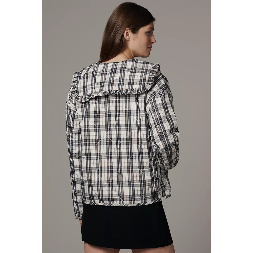 Quilted plaid jacket back with a wide ruffled shoulder flap