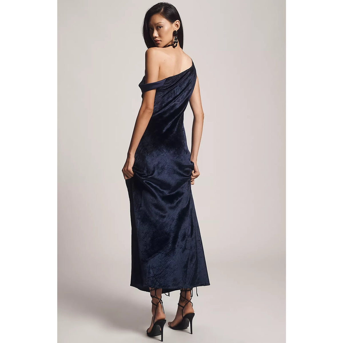 Navy velvet off-shoulder maxi dress with off-shoulder neckline and long straight skirt