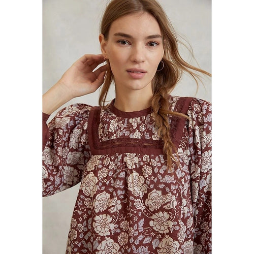Floral lace blouse in burgundy with white motifs and long puffed sleeves