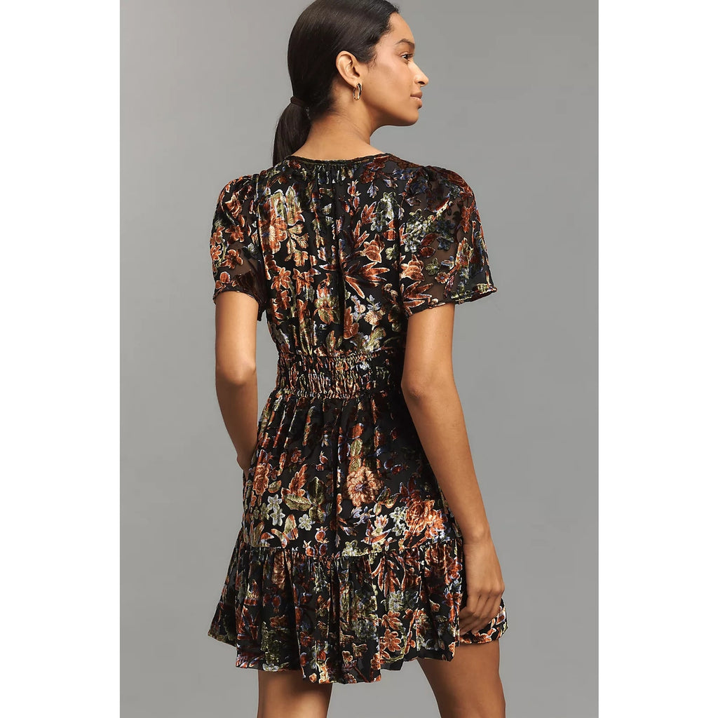 Black floral burnout velvet mini dress with short puff sleeves and tiered skirt