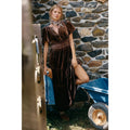Chocolate velvet maxi dress with tiered skirt, short sleeves, V-neck, and smocked waist