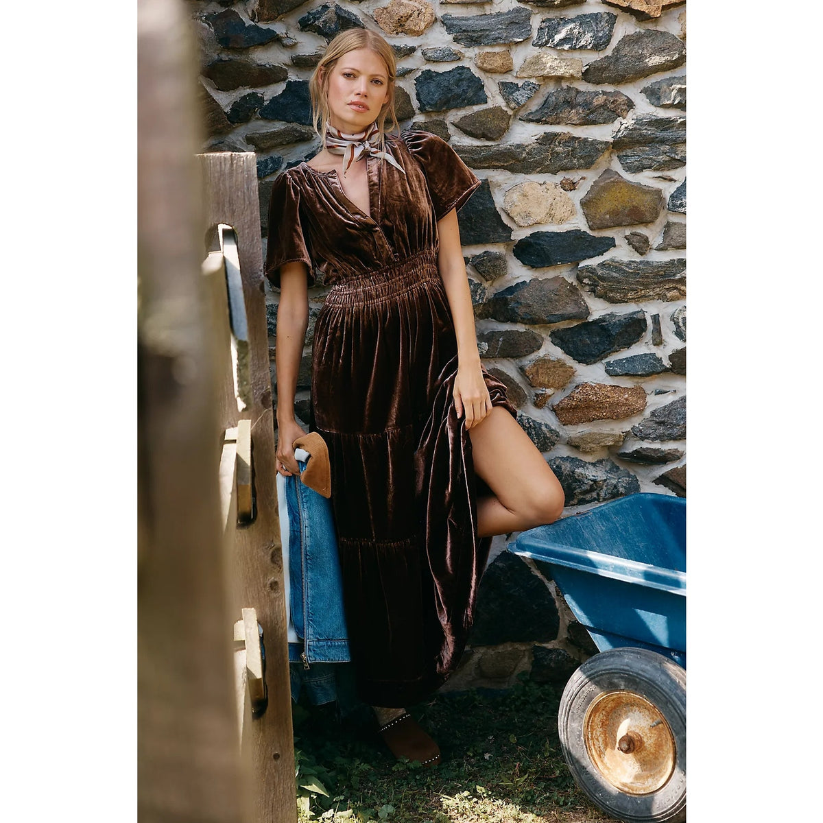 Chocolate velvet maxi dress with tiered skirt, short sleeves, V-neck, and smocked waist