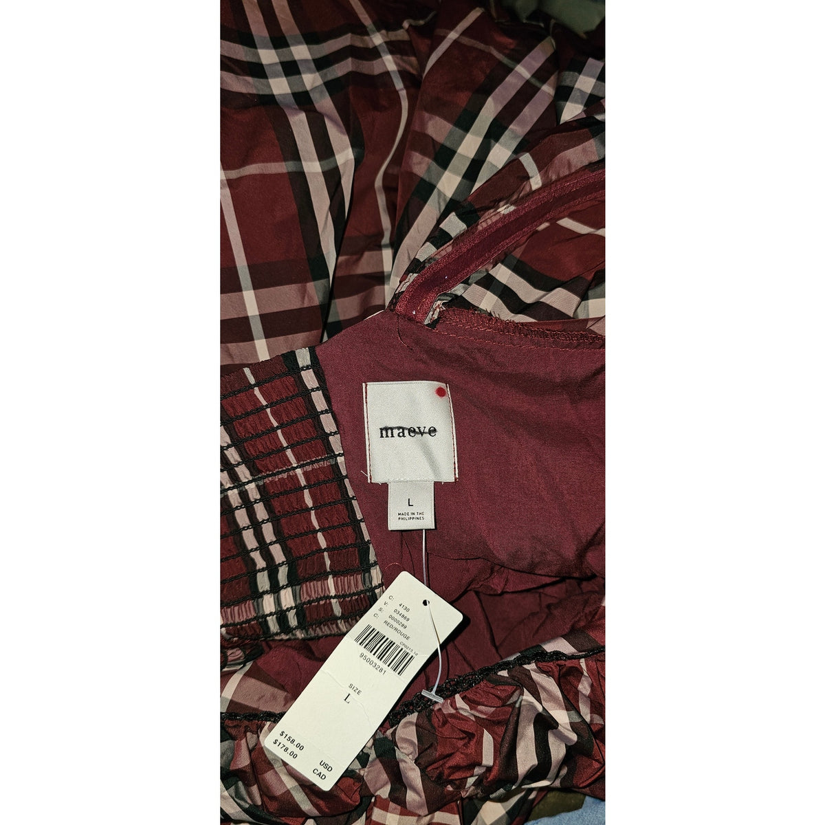 Maeve plaid dress fabric with tags, maroon and cream woven check and barcode