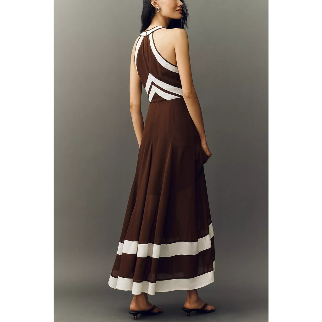 Brown halter maxi dress with open-back halter straps and geometric stripe hem border