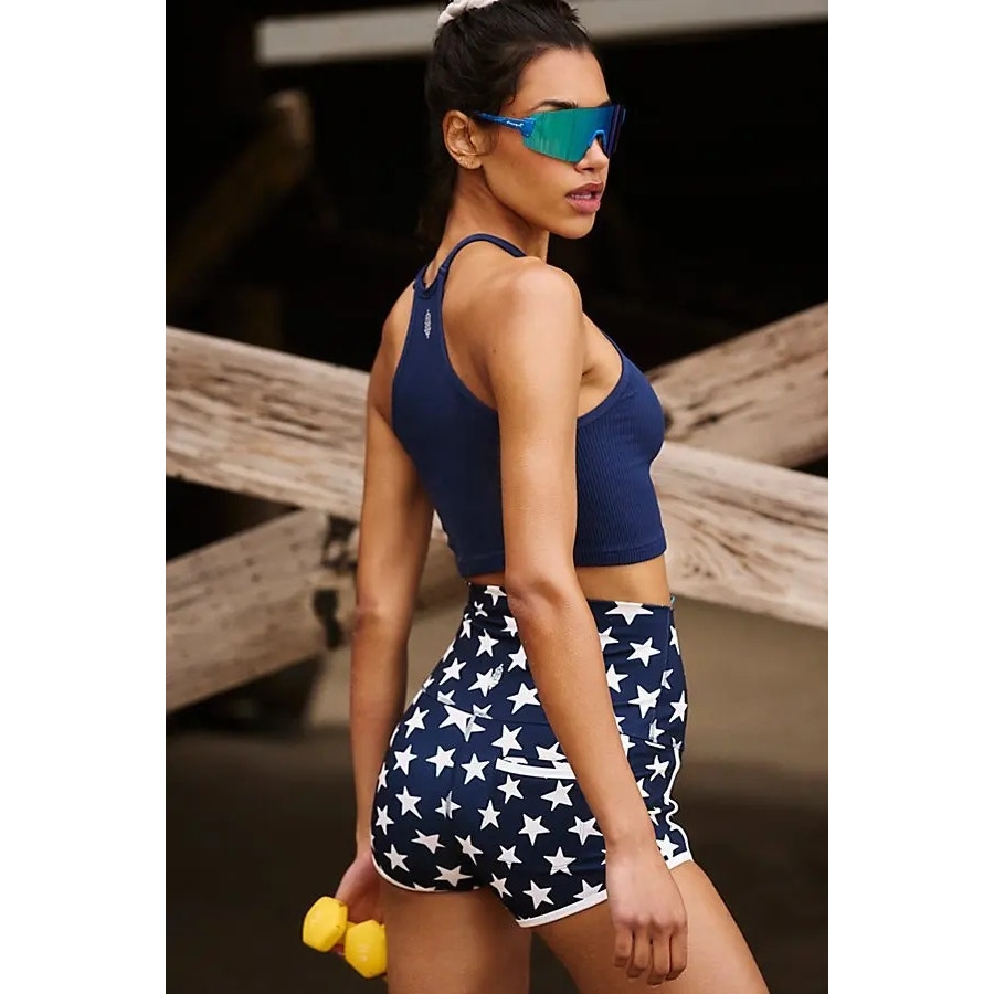Navy star-print shorts with white stars, back view and elastic waistband