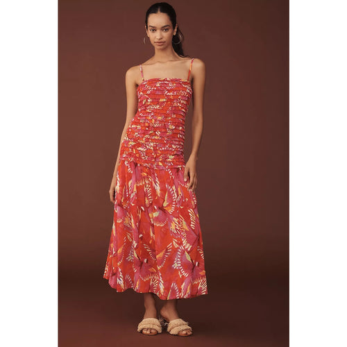 Orange printed midi dress with spaghetti straps, shirred bodice, drop-waist skirt
