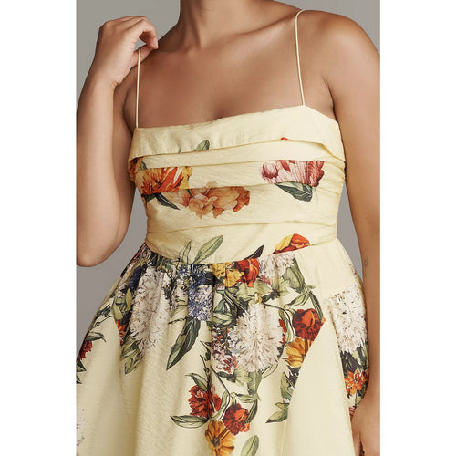 Yellow floral mini dress close-up of smocked bodice, spaghetti straps, gathered waist