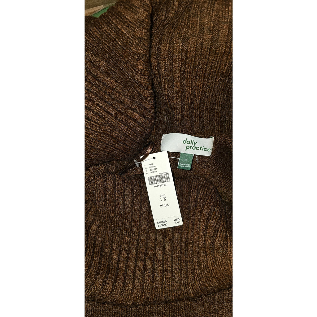 Brown knit midi sweater dress closeup with ribbed texture and inside size label