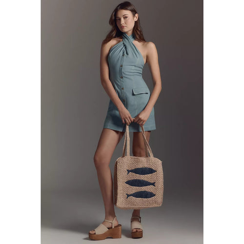 Light blue halter mini dress with button front and patch pocket, sleeveless