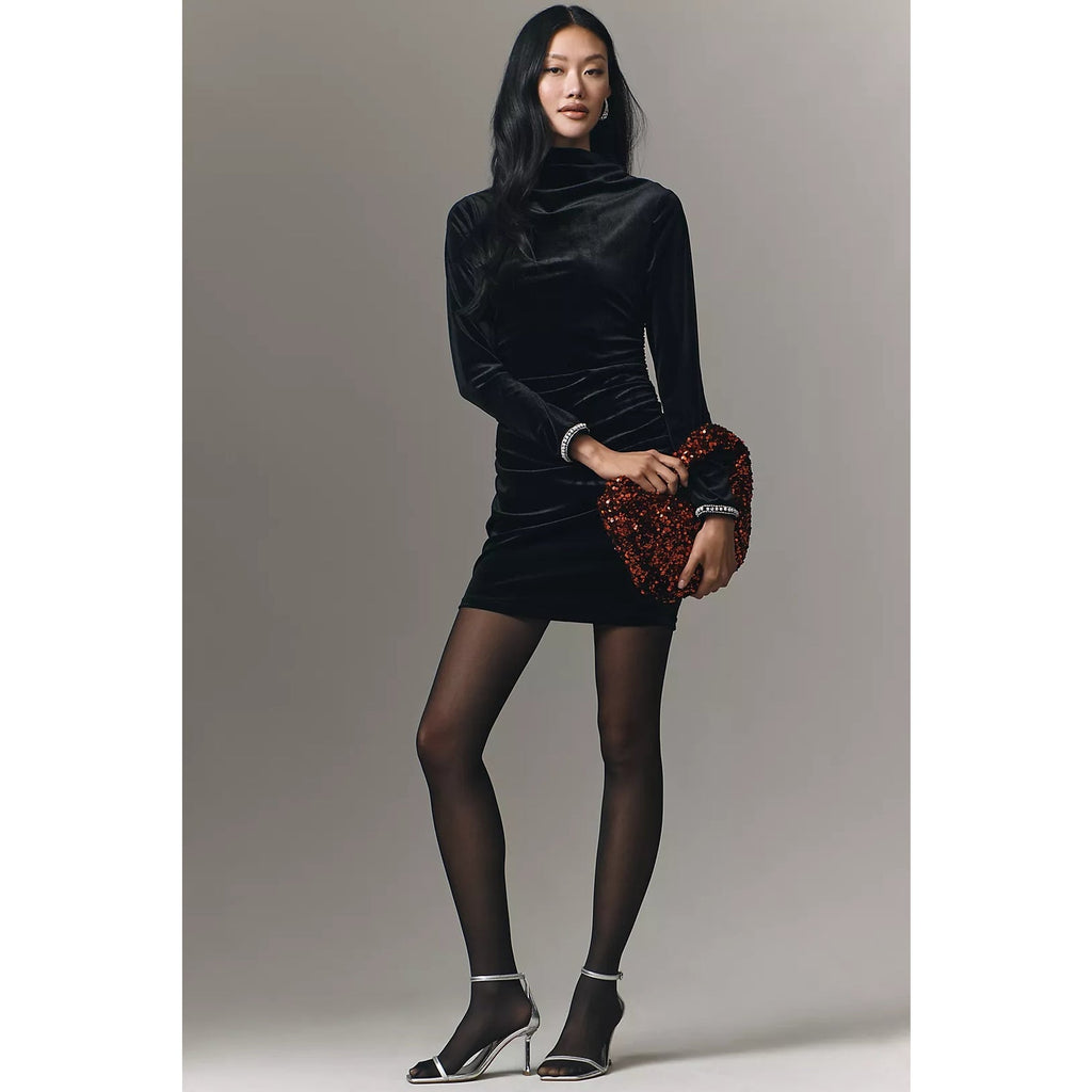 Black ruched cowl-neck mini dress with shiny finish and jeweled cuff details