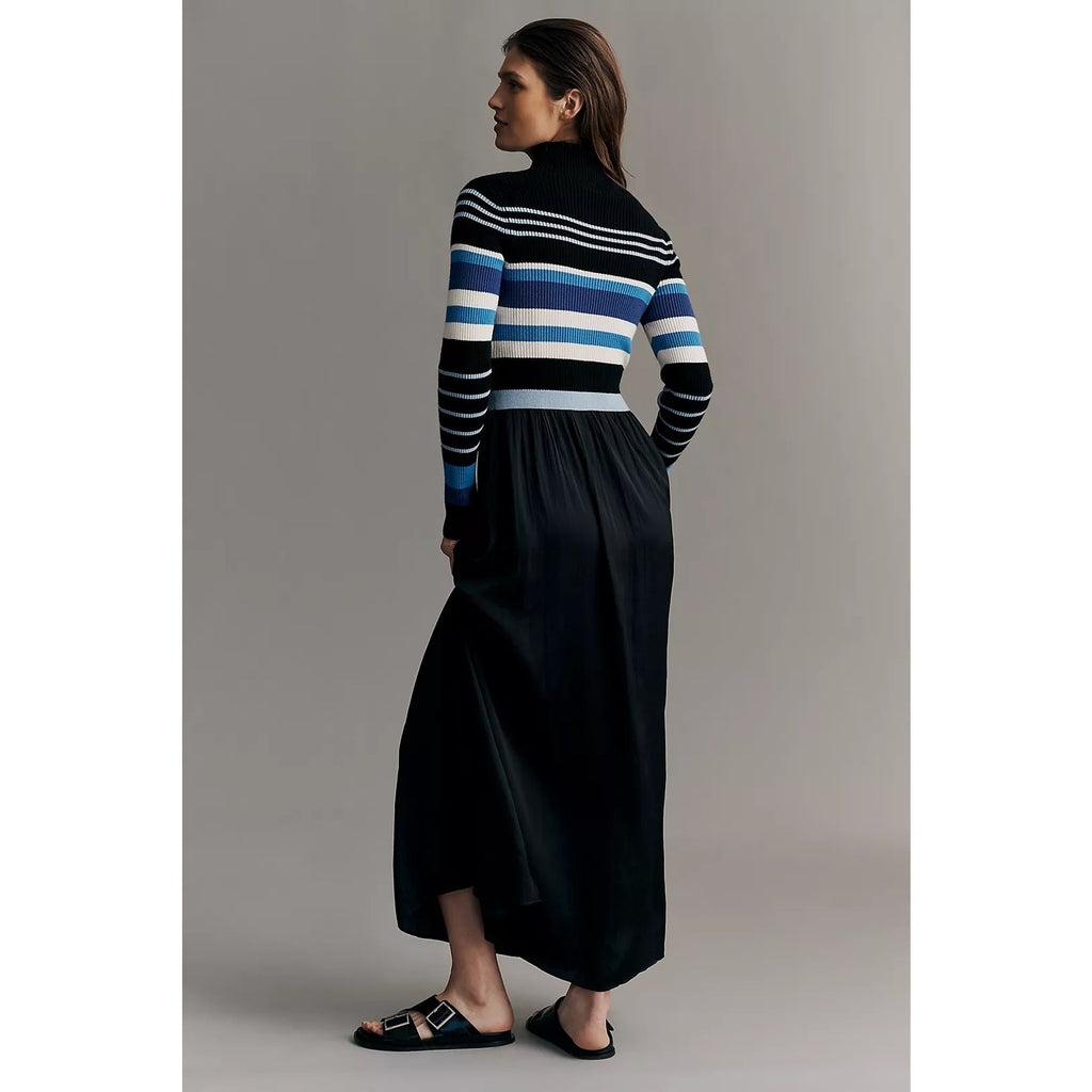 Anthropologie Thea maxi dress shown from the back, with striped sweater top and gathered black skirt