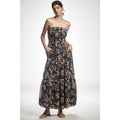 Strapless tiered maxi dress in dark blue with colorful floral print, ruched bodice