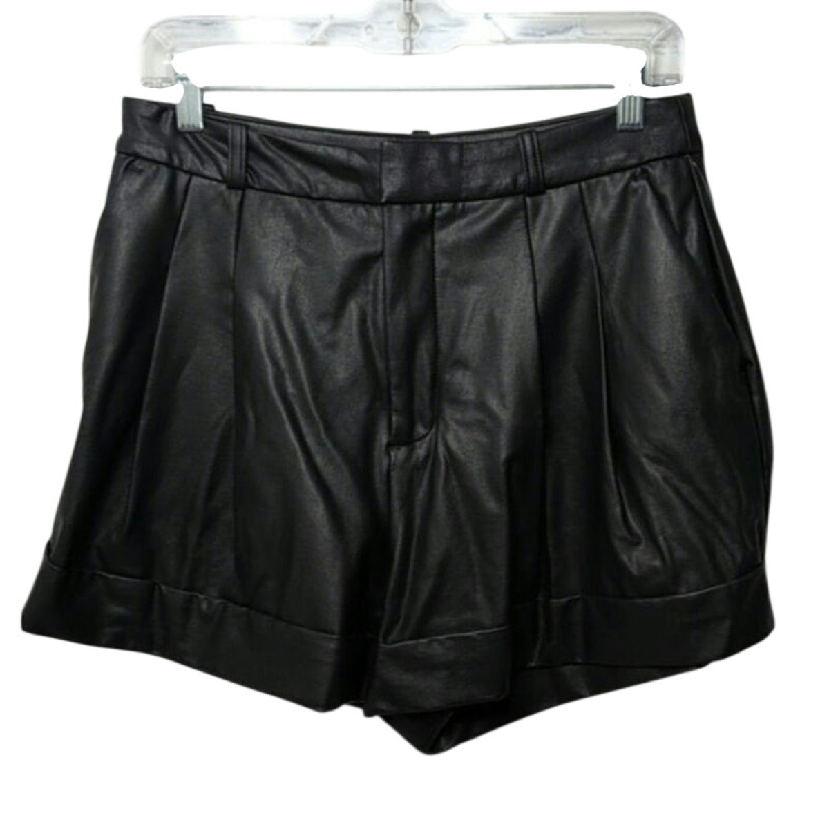 Black faux leather shorts on hanger with pleated front and side pocket details