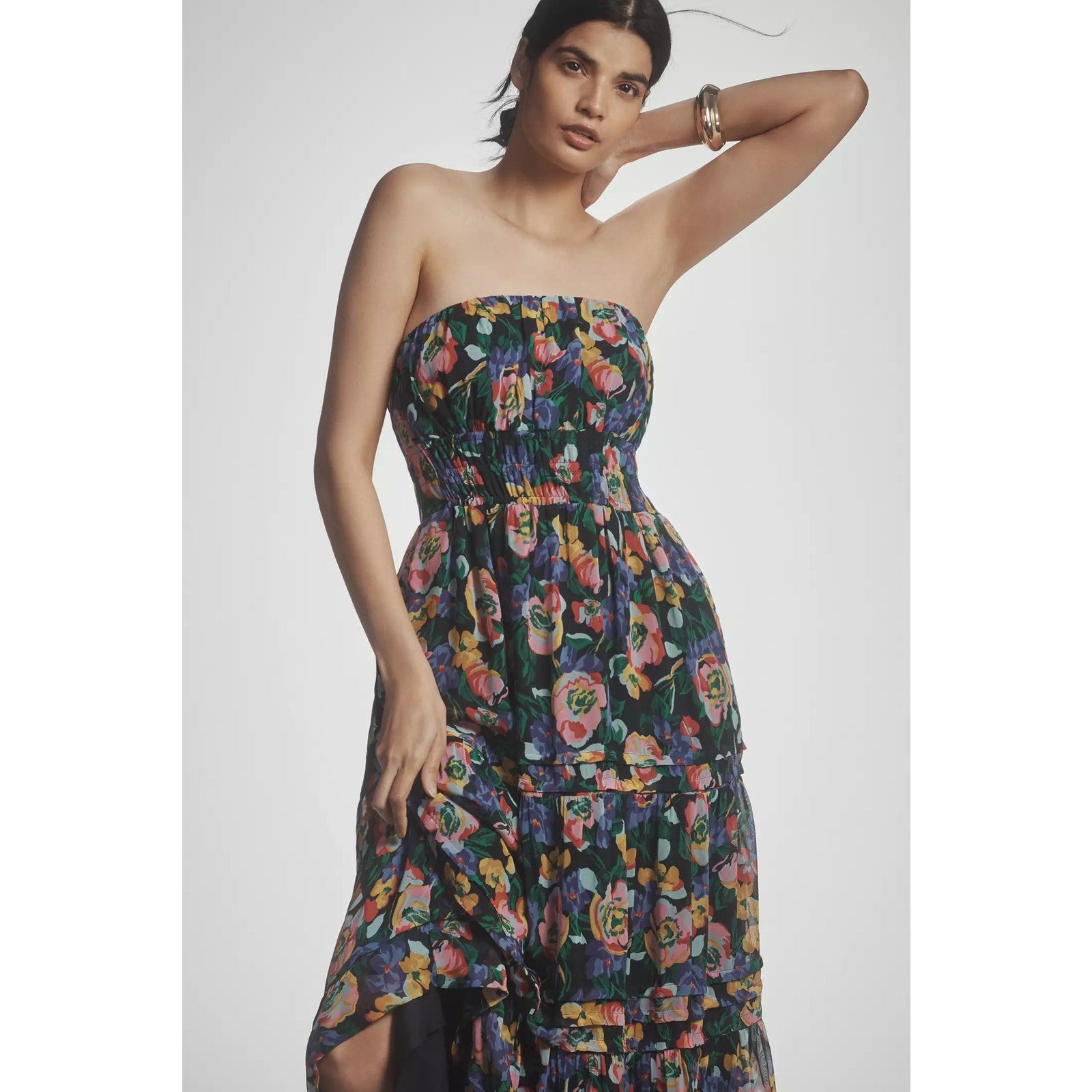 Strapless tiered maxi dress with colorful floral print and gathered ruched bodice