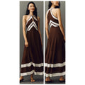 Brown halter maxi dress with white-and-cream geometric stripes and tiered hem border