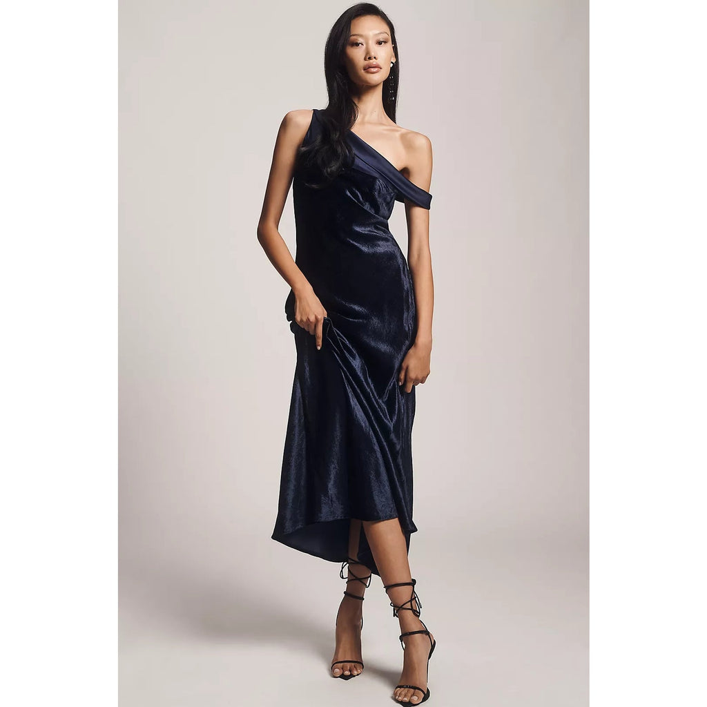 Navy velvet off-shoulder maxi dress with asymmetrical neckline and draped bodice