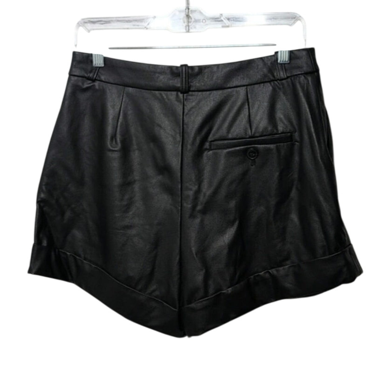Black faux leather cuffed shorts with back welt pocket and stitched panels