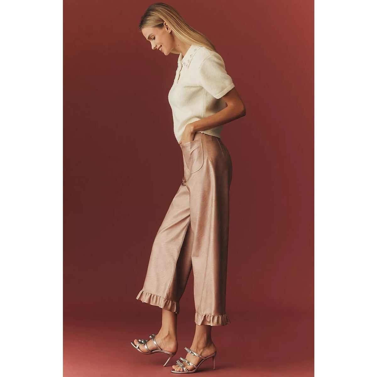Rose metallic faux leather wide-leg pants with ruffled hem detail and curved pocket