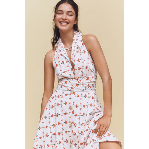 White halter midi dress with red floral print, sleeveless bodice and tiered skirt