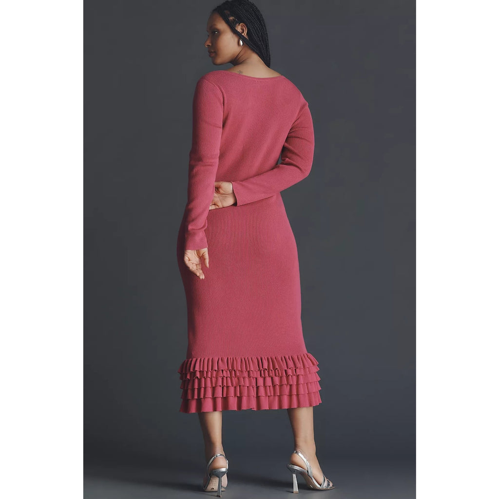 Pink midi sweater dress with ruffle hem and long sleeves, viewed from the back