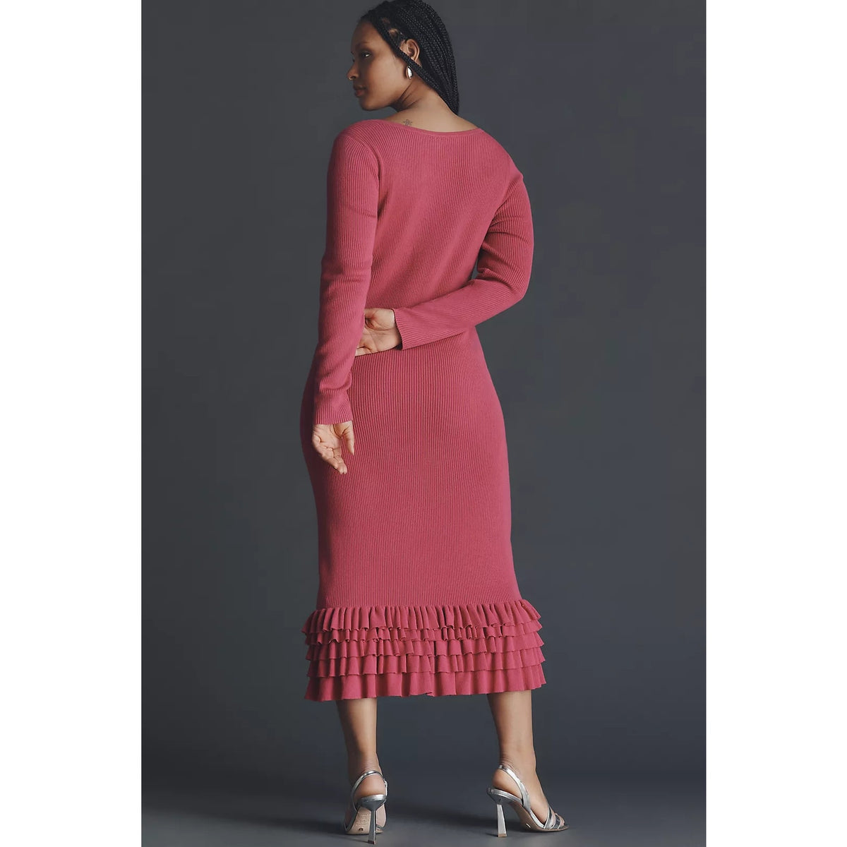Pink midi sweater dress with ruffle hem and long sleeves, viewed from the back