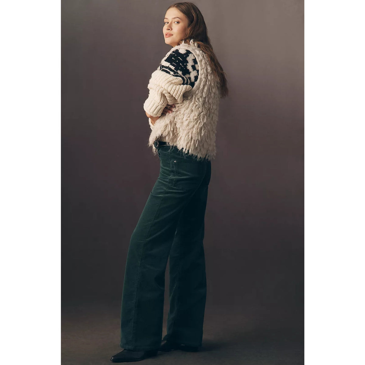 Green high-rise wide-leg jeans, side view with front seam