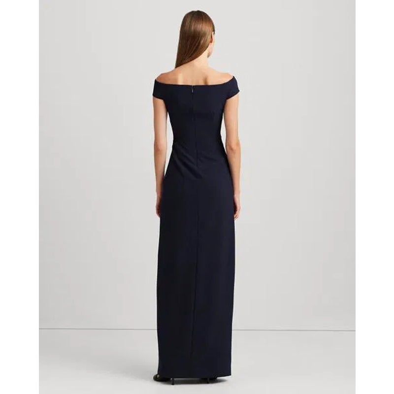 Navy off-shoulder gown back view with wide neckline and long, sleek column silhouette