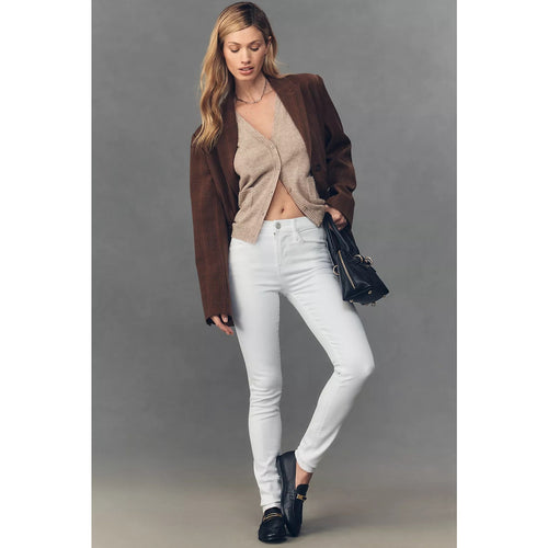 White high-rise skinny jeans with button and zip front