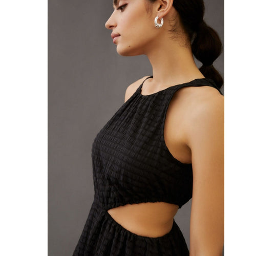 Black sheer A-line mini dress with sleeveless neckline and open back cutout