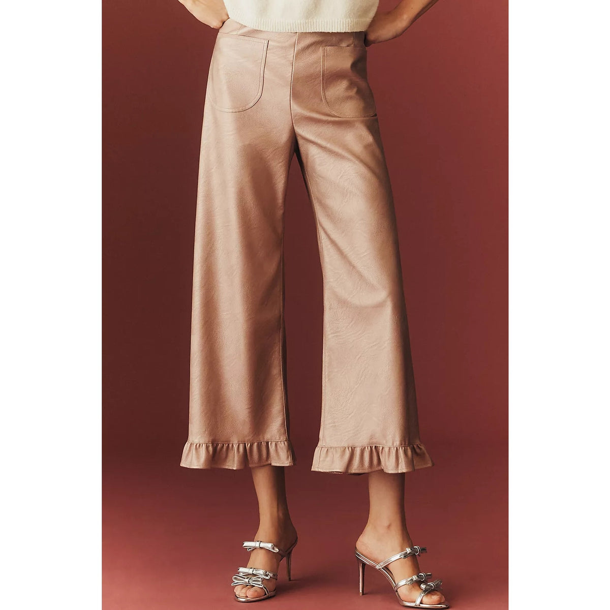 Rose metallic faux leather wide-leg pants with ruffled cuffs and curved side pockets