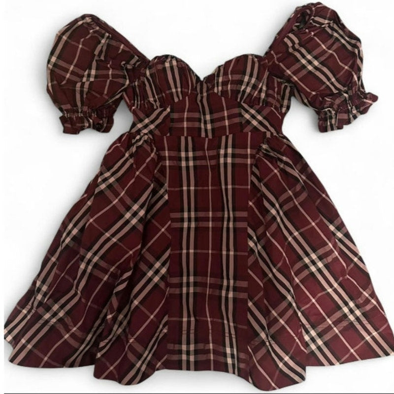 Plaid mini dress flat lay with puff sleeves and gathered skirt, red and cream check